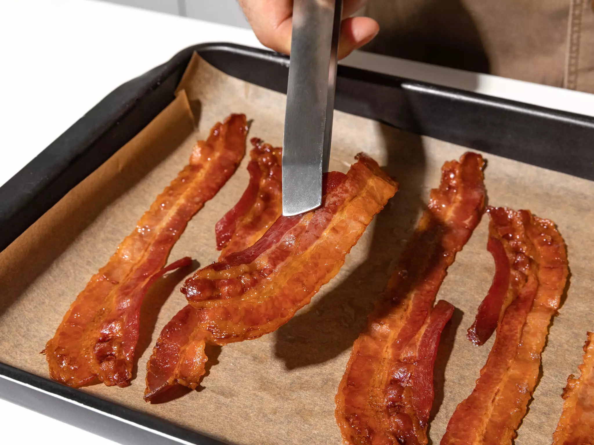Speck auf einem Backblech.